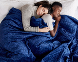 Couple sleeping under Navy Queen/King Blanket