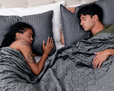 Couple sleeping under Grey Queen/King Blanket